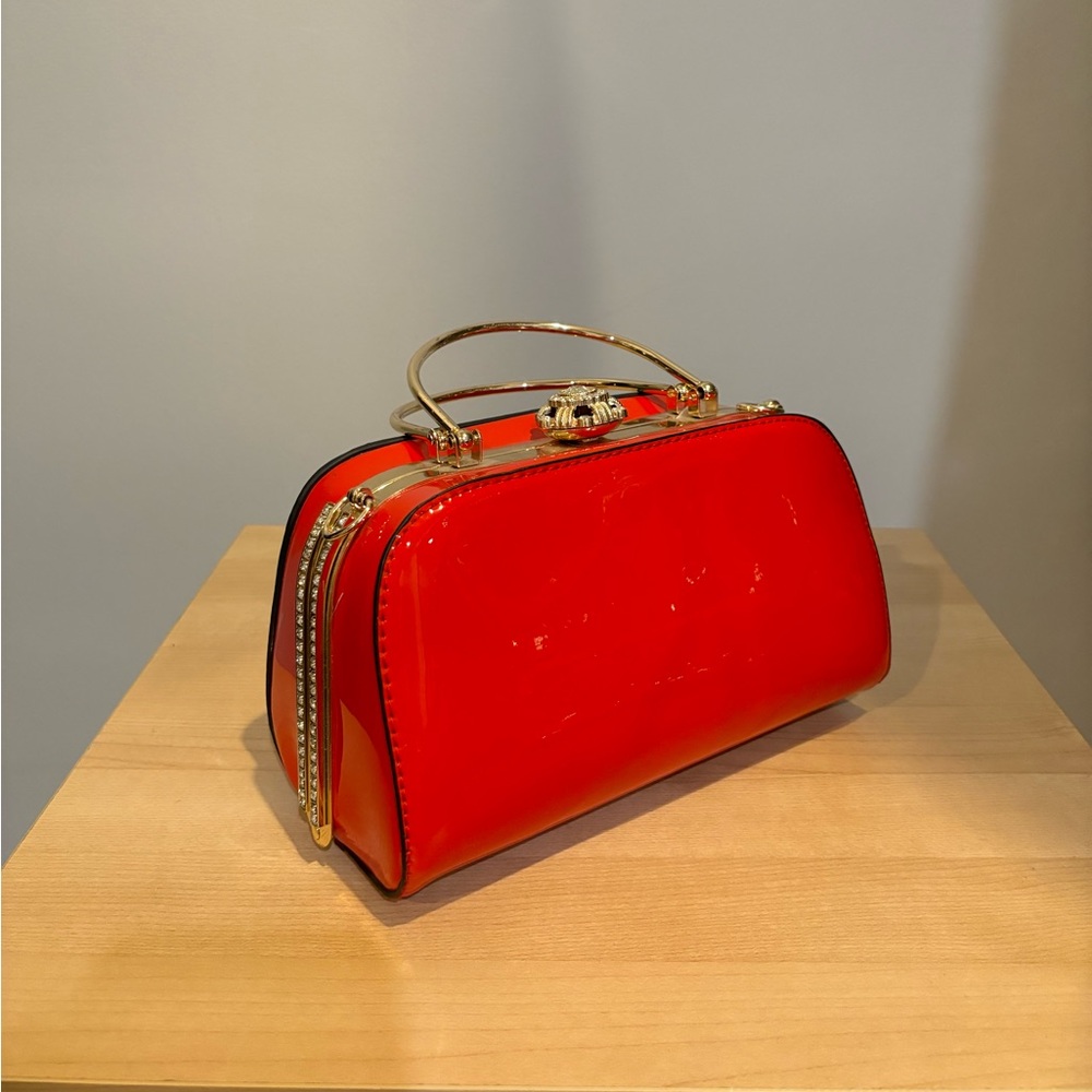 Red glamorous bag never used with big strap